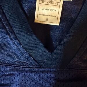 Dallas  Cowboy’s number 9 baseball legend, Romo’s, jersey.  Size M.